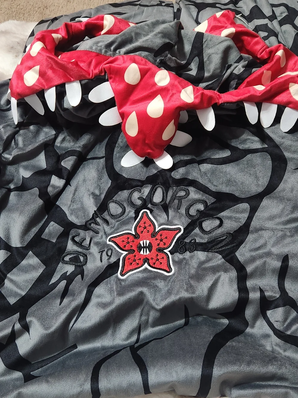 Stranger Things Demogorgon Onsie- Dark Gray with Red Hood Accents ADULT SMALL